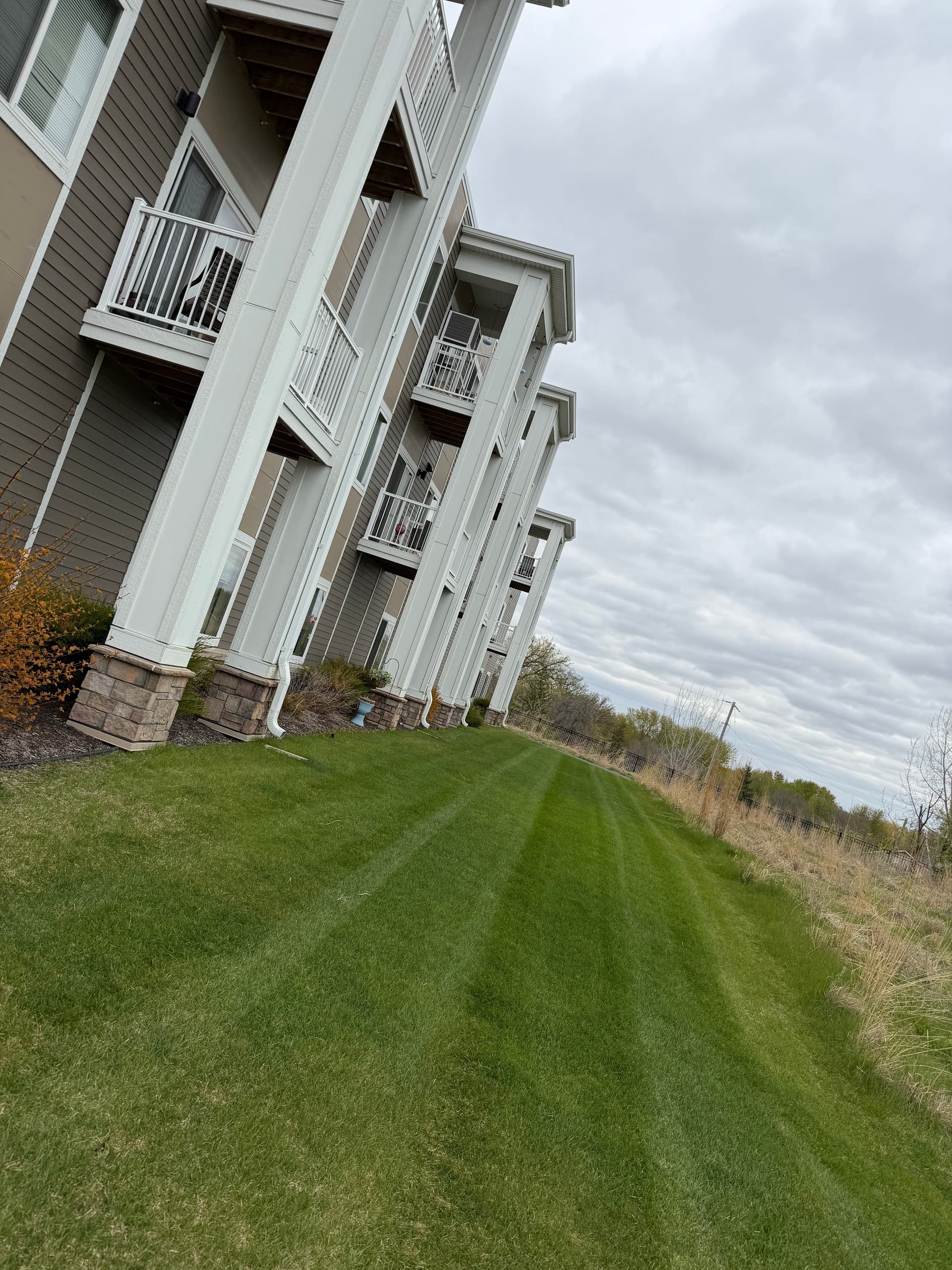 Gallery photos for Weekly Lawn Maintenance Across Residential and Commercial Properties: Image #1