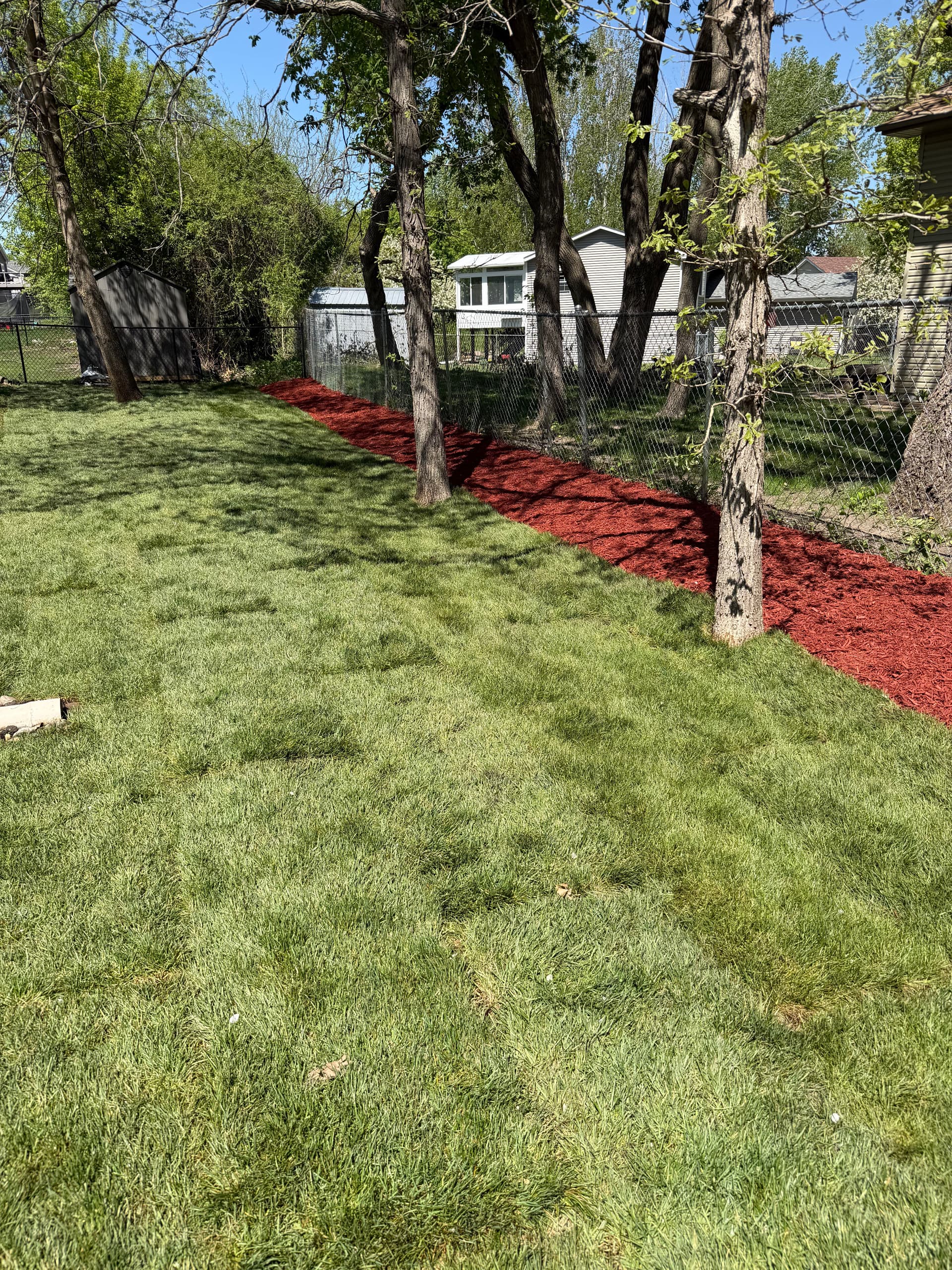 Backyard Overhaul in Buffalo MN - Sod, Grading, and Mulch Beds image