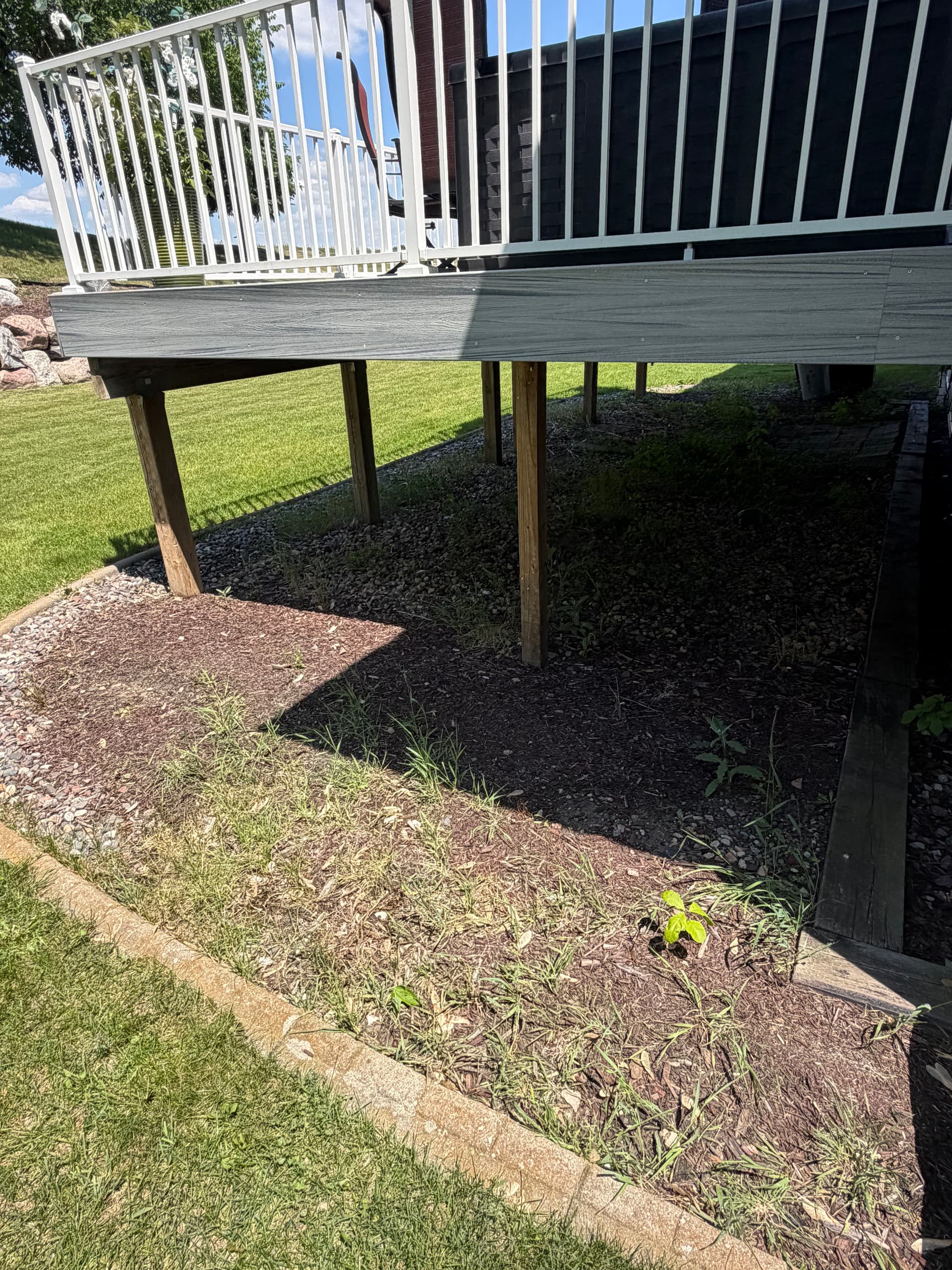 Gallery photos for Under-Deck Cleanup and Rock Install in Wright County MN: Image #3