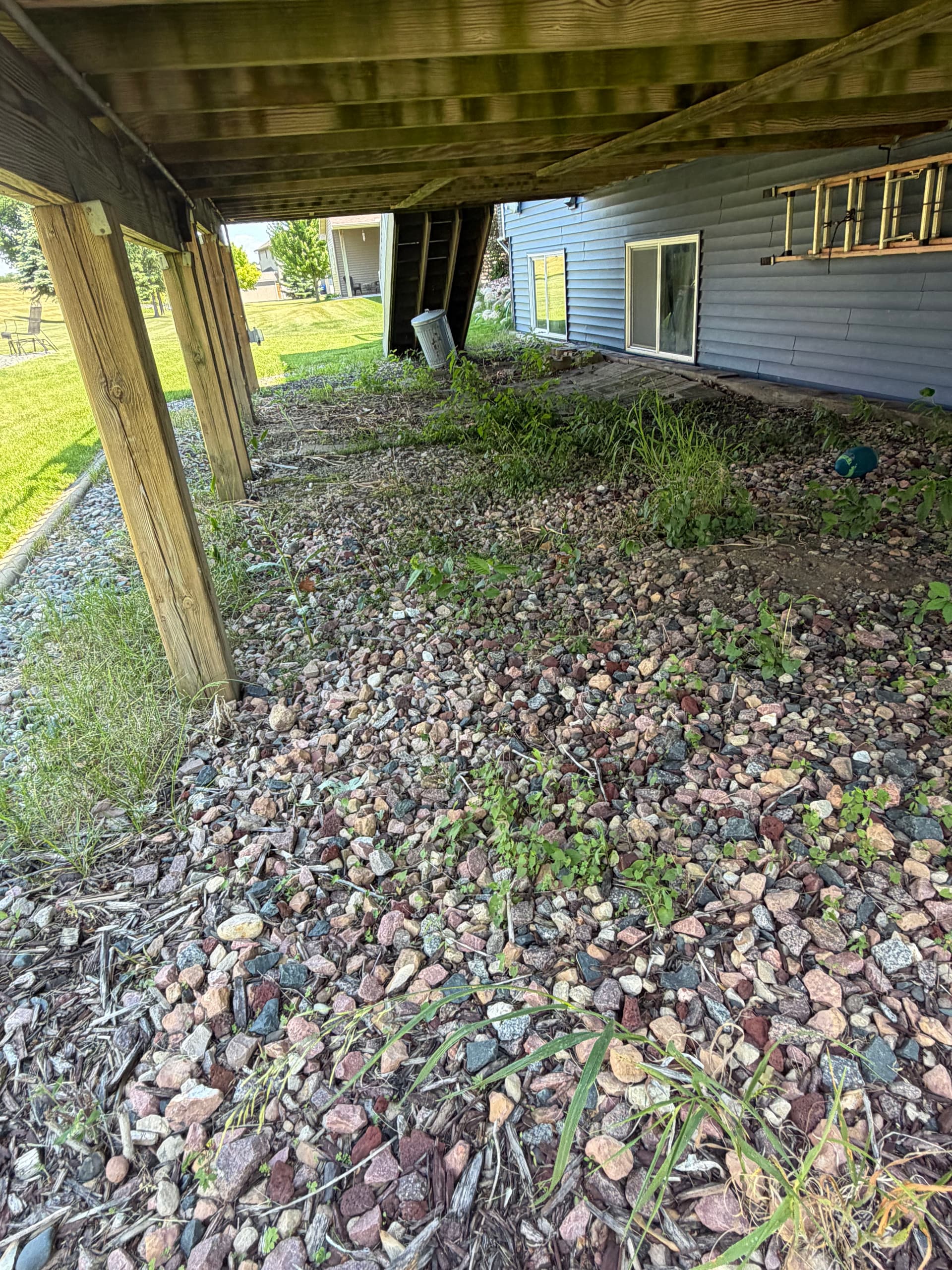 Gallery photos for Under-Deck Cleanup and Rock Install in Wright County MN: Image #1
